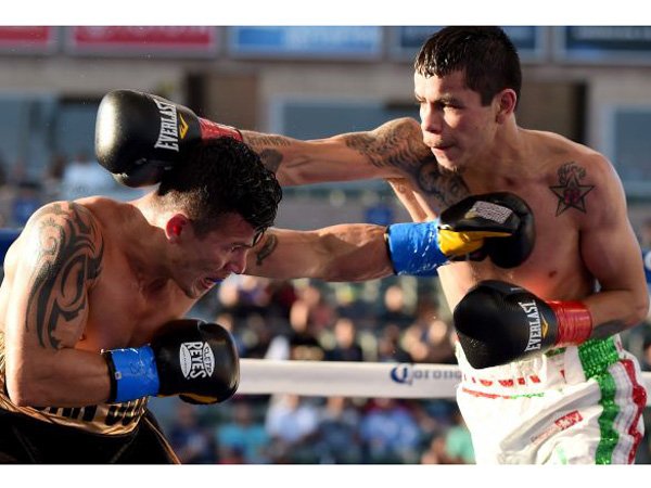 Berita Tinju: Flores Pertahankan Gelar WBA & Rebut Gelar IBO