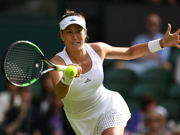Berita Tenis: Ana Ivanovic Tersingkir, Garbine Muguruza Berusaha Keras