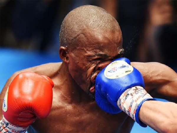 Mthalane Juarai IBF Meski Wajahnya Babak Belur