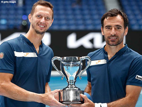 Ivan Dodig [kanan] dan Filip Polasek [kiri] jadi pasangan nomor ganda terakhir yang berdiri di Australian Open 2021