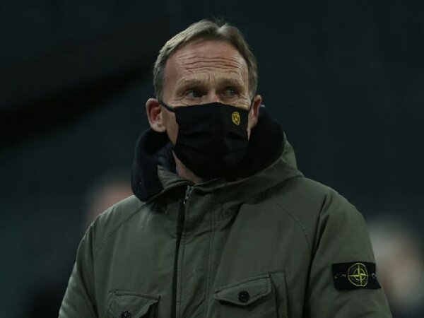 Hans-Joachim Watzke mengaku siap bertahan di Borussia Dortmund sampai krisis finansial mereka berakhir