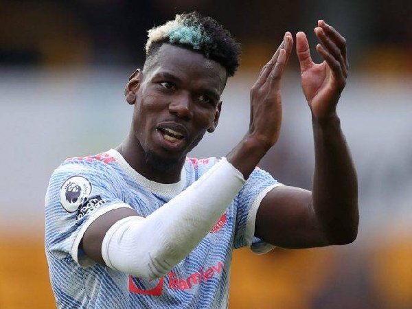 Menurut Carlton Palmer, tekanan pada Paul Pogba di Manchester United sudah berkurang