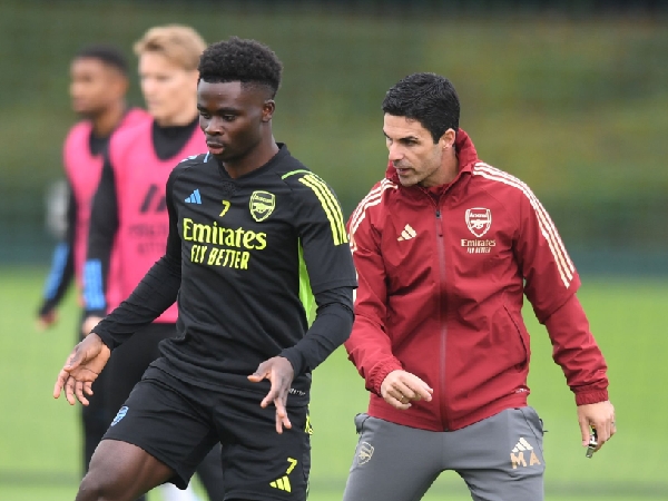 Bukayo Saka dan manajer Arsenal, Mikel Arteta