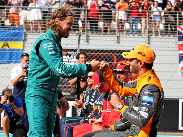 Daniel Ricciardo dan Sebastian Vettel