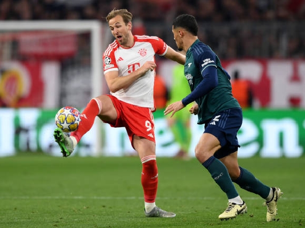 Harry Kane membantu Bayern Munich menyingkirkan Arsenal