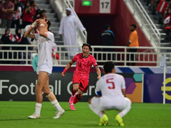Pemain Korsel U-23, Jeong Sang-bin merayakan gol penyama kedudukan ke gawang timnas Indonesia U-23