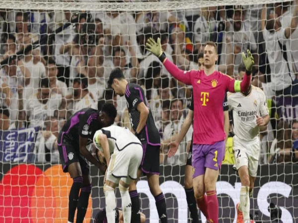 Manuel Neuer buka suara perihal blunder yang ia buat di laga Real Madrid vs Bayern Muenchen dini hari tadi (9/5) / via Getty Images