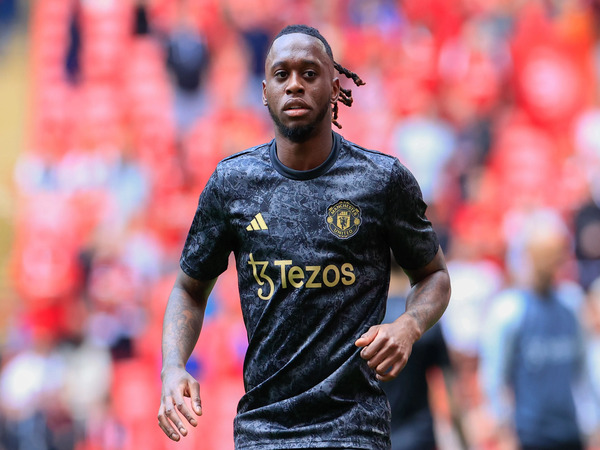 Laporan terbaru di Inggris menyebutkan jika MU dan Inter berpotensi melakukan transaksi pertukaran pemain yang melibatkan Aaron Wan-Bissaka dengan Denzel Dumfries / via Getty Images