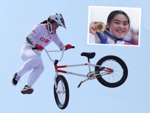 Juara Olimpiade Deng Yawen ternyata tak sengaja terjun menekuni sepeda BMX semasa sekolah. (Foto: Xinhua)