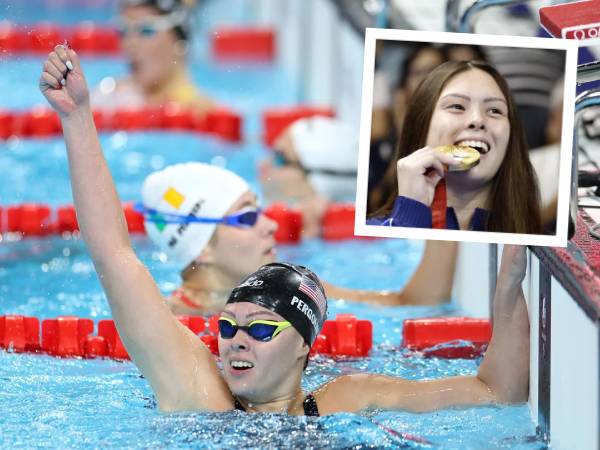 Gia Pergolini melakukan selebrasi setelah memenangi final gaya punggung 100 meter putri S13. (Foto: AP)