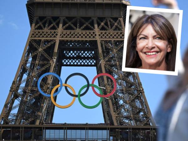 Cincin Olimpiade terpasang di Menara Eiffel. Inset: Anne Hidalgo. (Foto: AFP)