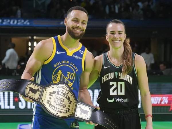 Stephen Curry (kiri) mengalahkan Sabrina Ionescu 29-26 di adu tembakan tiga poin di All-Star Weekend musim lalu. (Foto: AP)