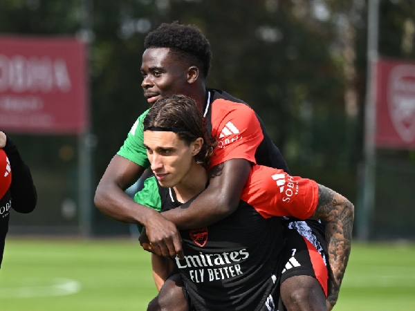 Riccardo Calafiori dan Bukayo Saka