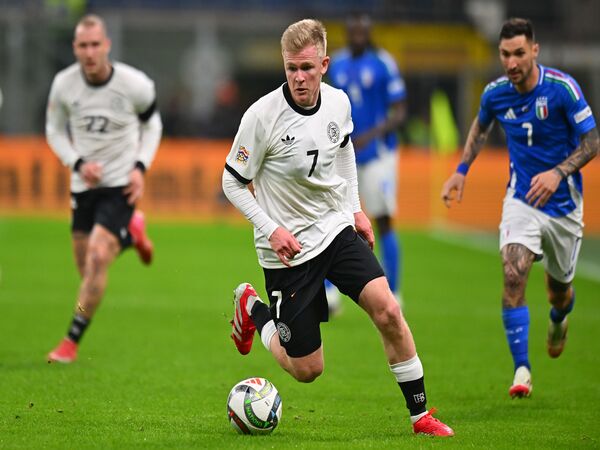 Striker Timnas Jerman yakni Jonathan Burkardt, menjadi satu dari dua nama yang dilirik oleh AC Milan pada bursa transfer musim panas 2025 / via AFP