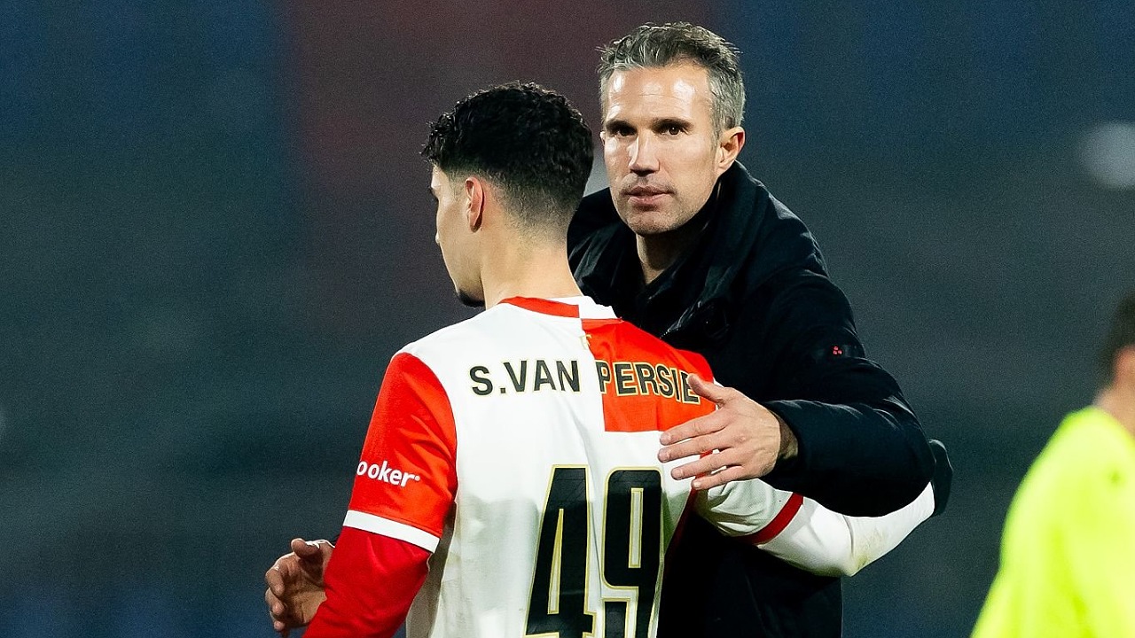 Robin van Persie dan putranya, Shaqueel. (Foto: ANP via Getty Images)