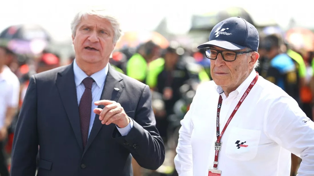 Carmelo Ezpeleta (CEO Dorna Sports) dan Jorge Viegas (Presiden FIM)