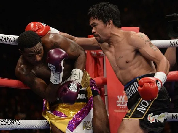 Menang Angka Atas Broner, Pacquiao Pertahankan Gelar Juara