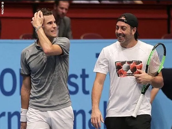 Dominic Thiem [kiri] raih banyak kesuksesan setelah bekerja sama dengan Nicolas Massu [kanan]