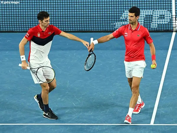 Novak Djokovic [kanan] dan Nikola Cacic [kiri] kalah dari tim Jerman di laga nomor ganda penentu ATP Cup 2021
