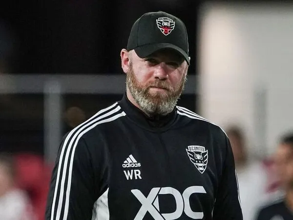 Setelah memutuskan mundur dari kursi manajer D.C. United, Wayne Rooney memberi kode bahwa dirinya bakal melatih salah satu klub Inggris / via Getty Images