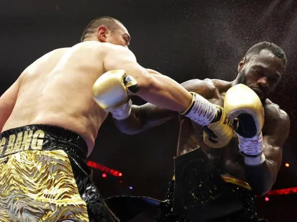 Zhilei Zhang Akhiri Perlawanan Deontay Wilder Dengan TKO Brutal Di Ronde 5