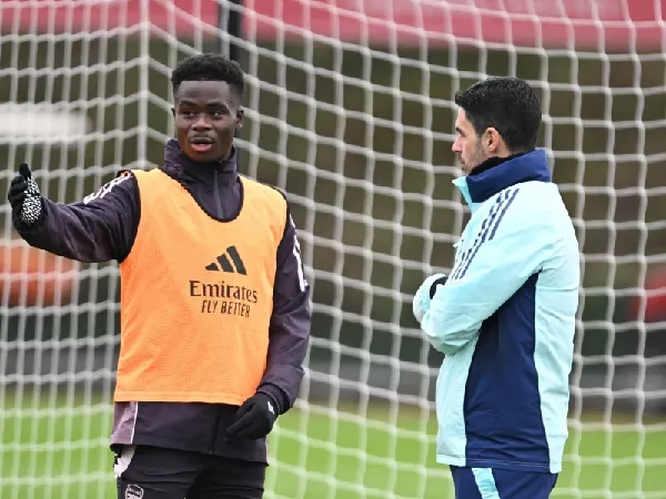 Bukayo Saka dan manajer Arsenal, Mikel Arteta