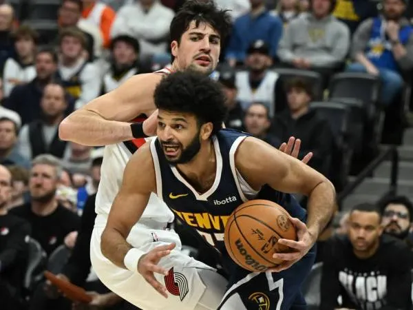 Jamal Murray mencetak 55 poin saat Denver Nuggets meraih kemenangan 132-121 atas tim tamu Portland Trail Blazers pada Rabu (12/2) malam.