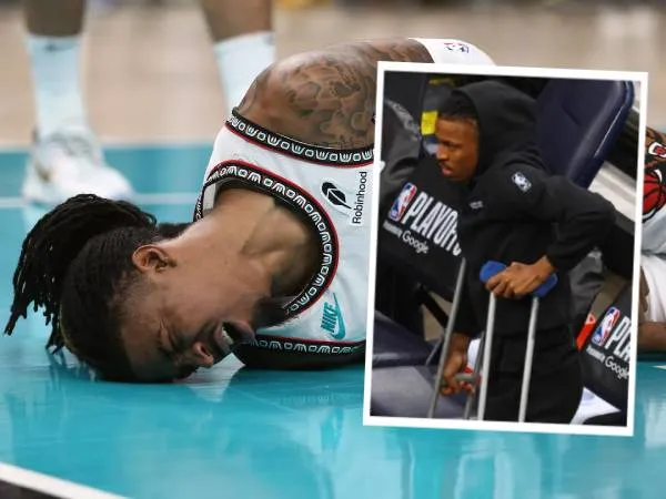 Ja Morant meringis kesakitan dan kemudian terlihat memakai kruk di Game 3 versus Thunder. (Foto: AP)