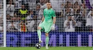 Andriy Lunin Ingatkan Bayern Munich: Real Madrid Belum Habis!