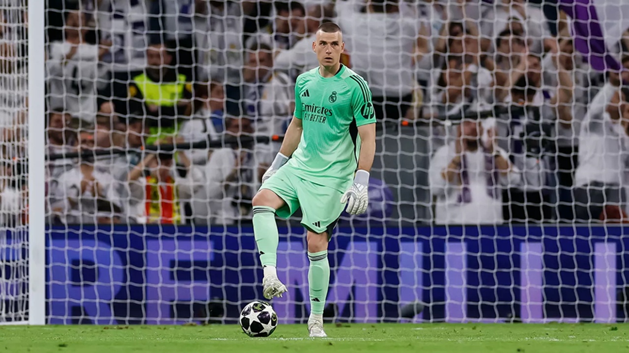 Andriy Lunin Yakin Peluang Real Madrid Masih Hidup di Kandang Bayern Munich