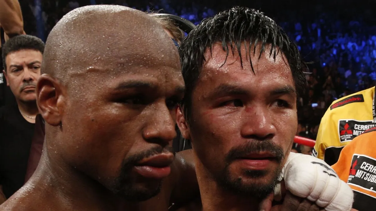 Floyd Mayweather dan Manny Pacquiao usai pertarungan pertama mereka. (Foto: Fight TV)
