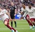 Penampilan Gemilang Trossard dan Raya Angkat Arsenal
