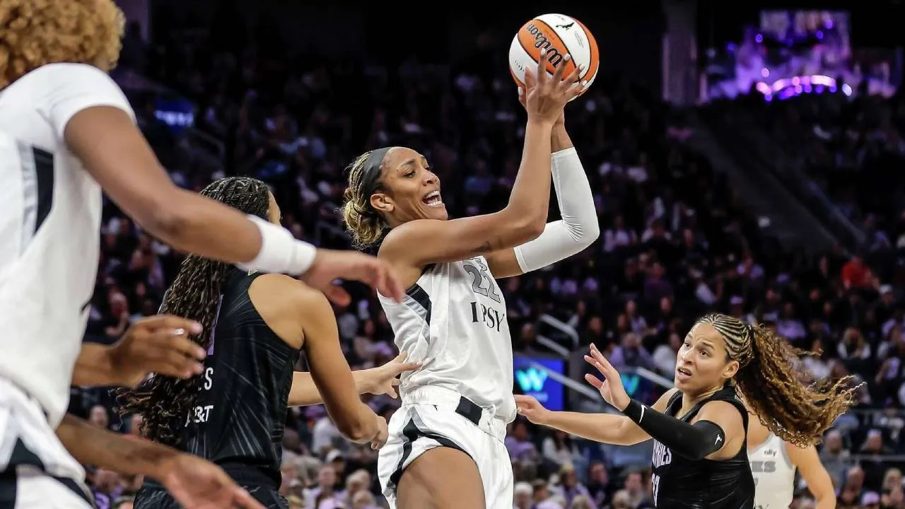 A'ja Wilson (tengah) mencetak 28 poin saat Las Vegas Aces mengalahkan Golden State Valkyries 91-81, Minggu (31/5) waktu setempat. (Foto: AP)