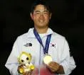 Tampil Tenang Berkat Tiger Woods, Tom Kim Raih Emas di Asian Games